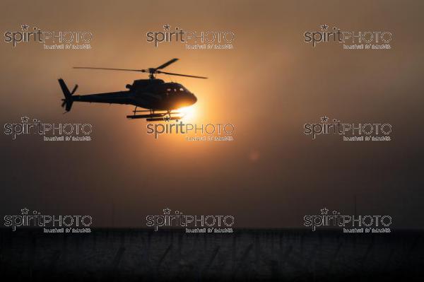 Helicopter being used to circulate warmer air and prevent frost damage to vineyard in sub-zero spring temperatures of 7 April 2021. Château Laroze, St-Émilion, Gironde, France. [Saint-Émilion / Bordeaux] (JBN_3591.jpg)